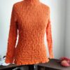 blusa na cor laranja , original anos 70, gola alta, o tecido é sintético com elastano